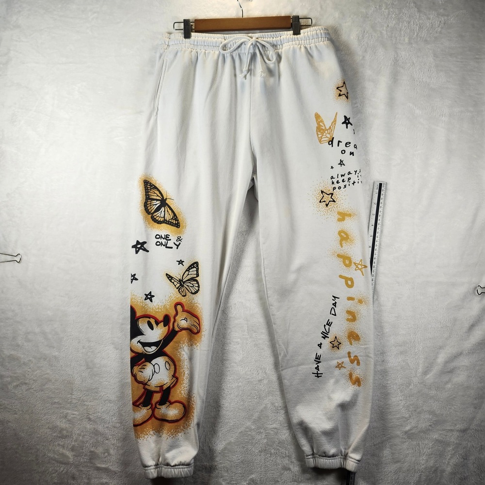 Disney White Track Joggers with Gold and Black Graphic